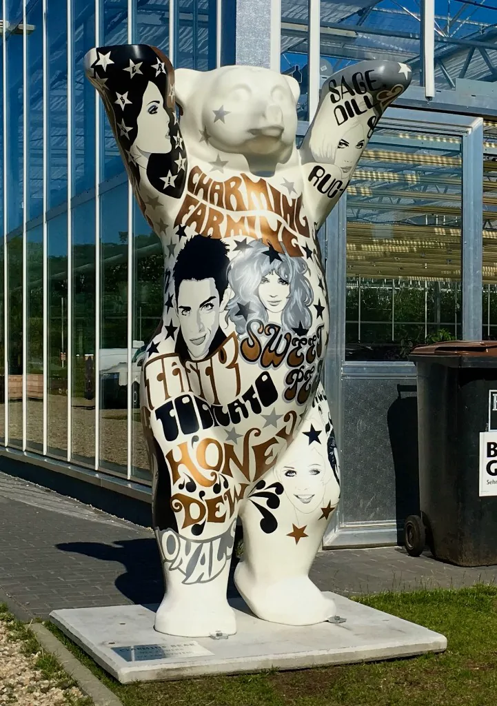 Charming Bear — Buddy Bear in daylight in front of the greenhouse